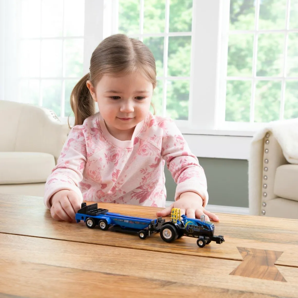 1/64 New Holland "Midnight Blue" Pulling Tractor with Pulling Sled