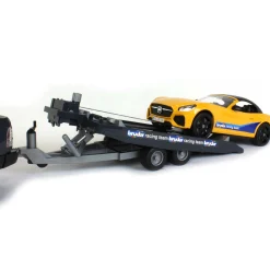 1/16 RAM 2500 Pickup with Yellow Racing Team Roadster by Bruder