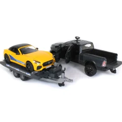 1/16 RAM 2500 Pickup with Yellow Racing Team Roadster by Bruder