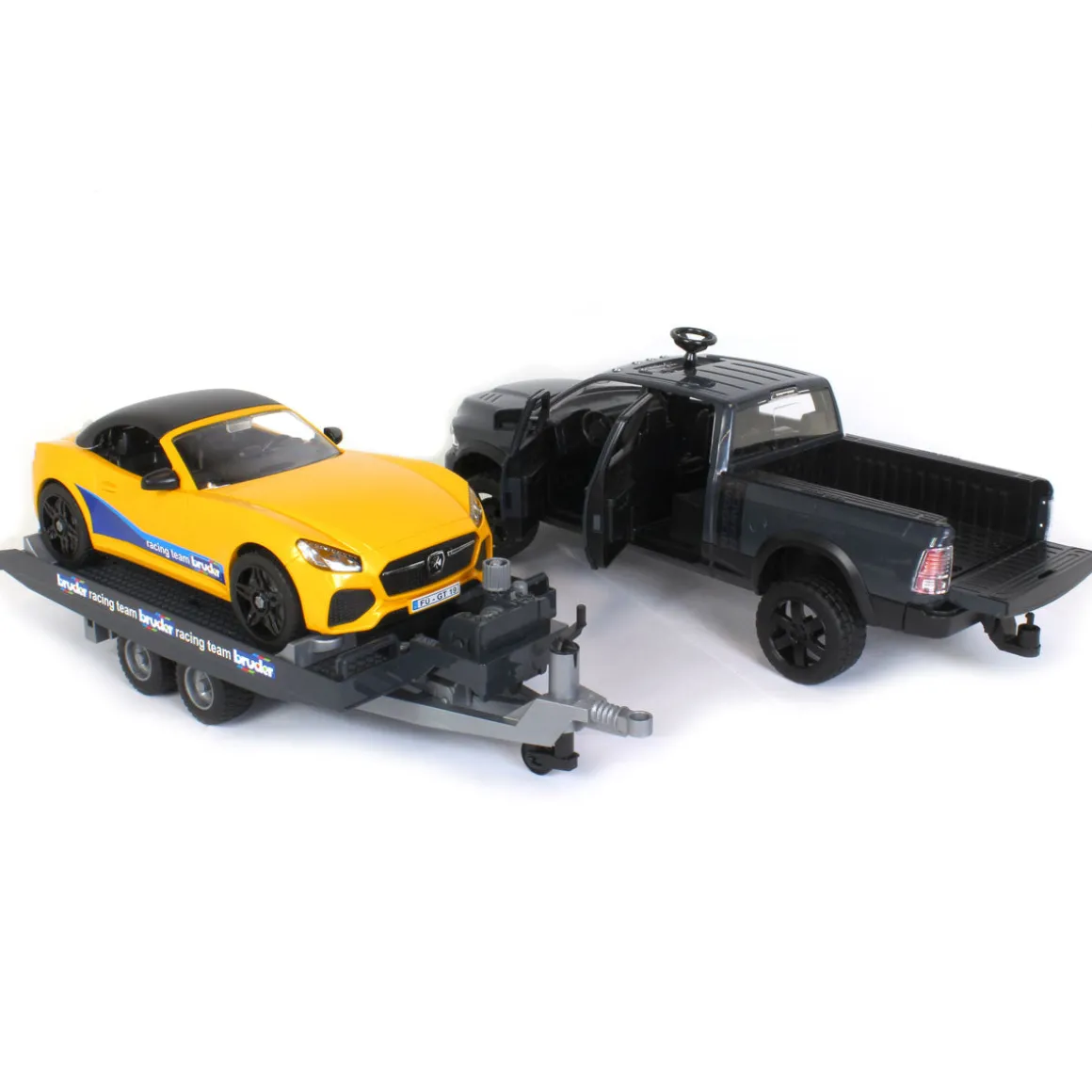 1/16 RAM 2500 Pickup with Yellow Racing Team Roadster by Bruder