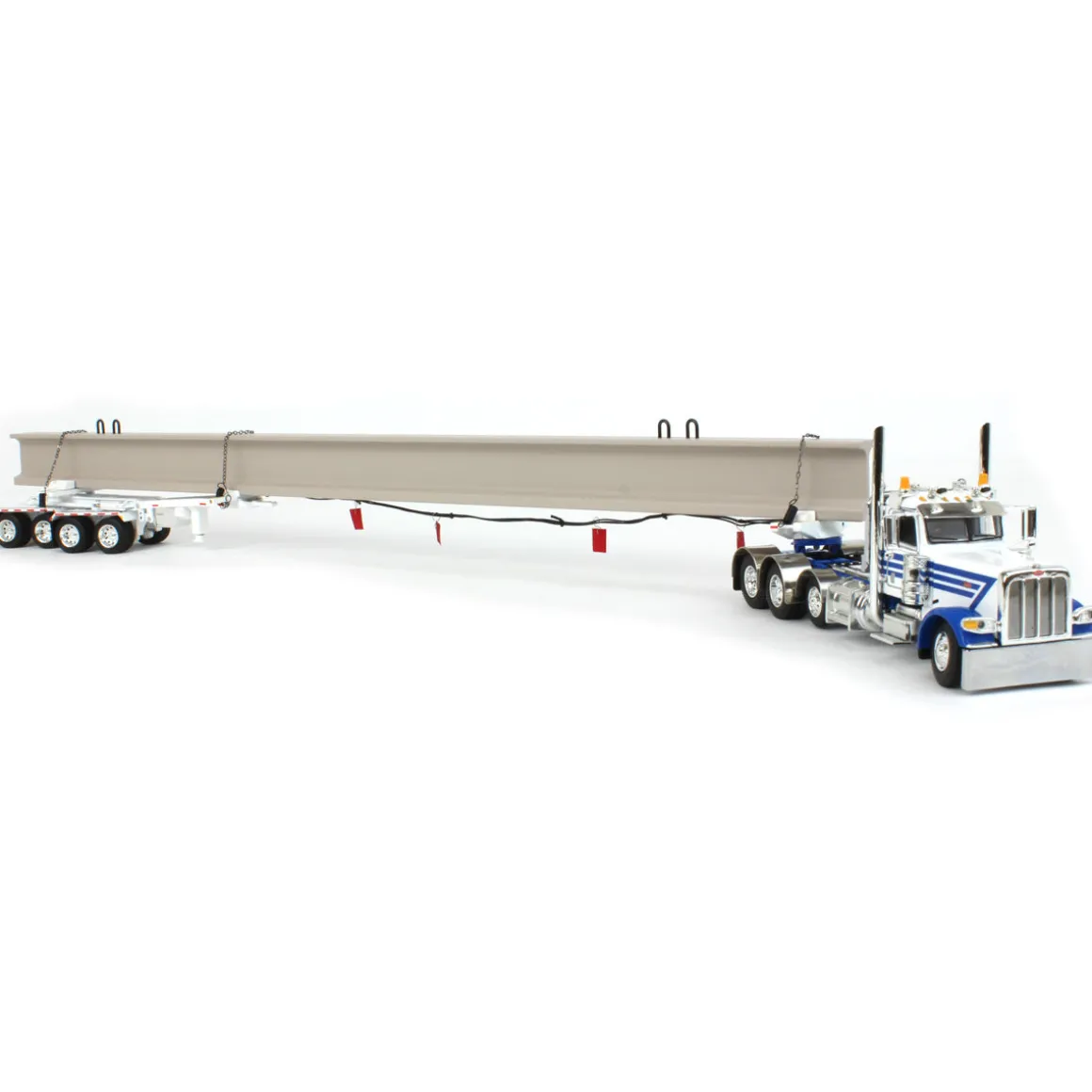 1/64 White/Blue Peterbilt 389 w/ ERMC Hydra-Steer Trailer & Bridge Beam Load, DCP by First Gear
