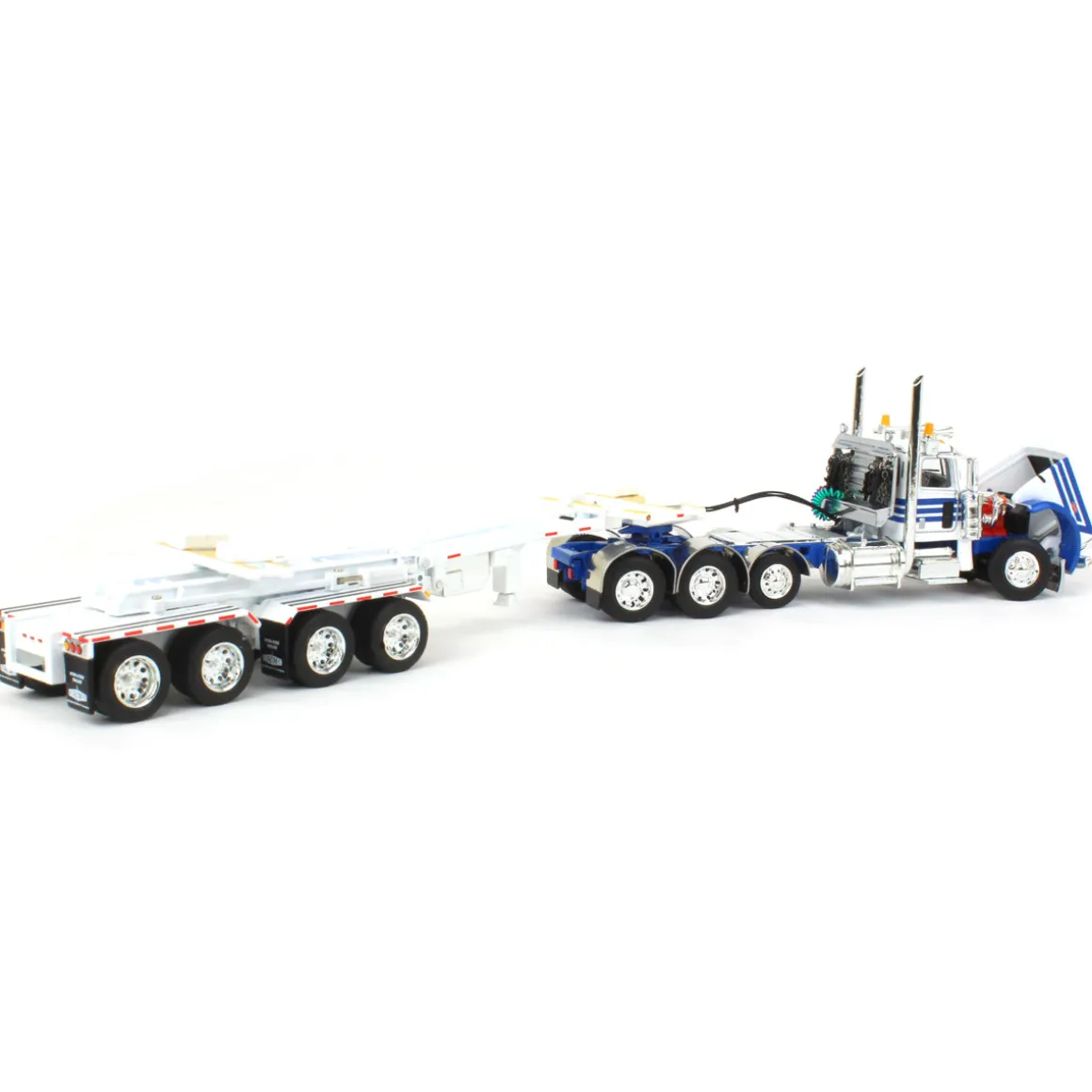 1/64 White/Blue Peterbilt 389 w/ ERMC Hydra-Steer Trailer & Bridge Beam Load, DCP by First Gear