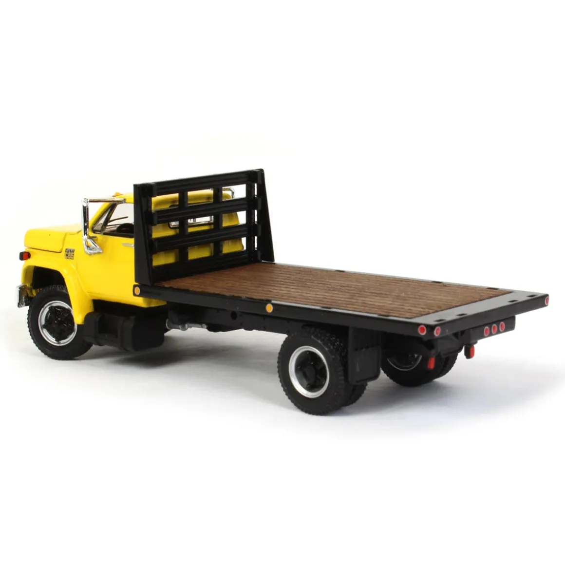 1/64 Yellow Chevy C65 Single Axle Truck with Black Flatbed, DCP by First Gear