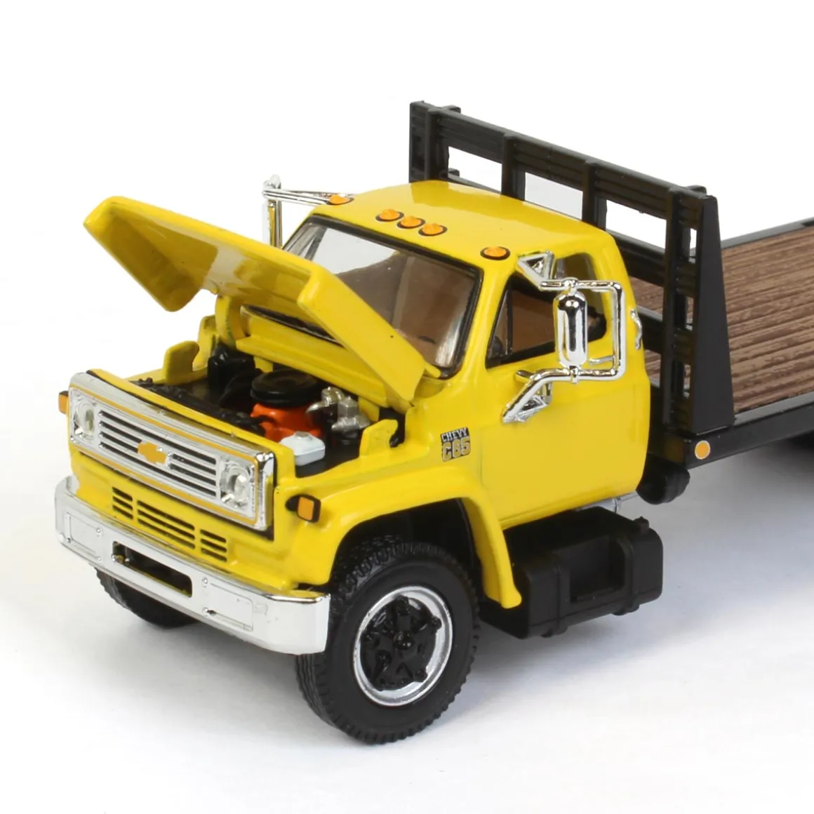 1/64 Yellow Chevy C65 Single Axle Truck with Black Flatbed, DCP by First Gear