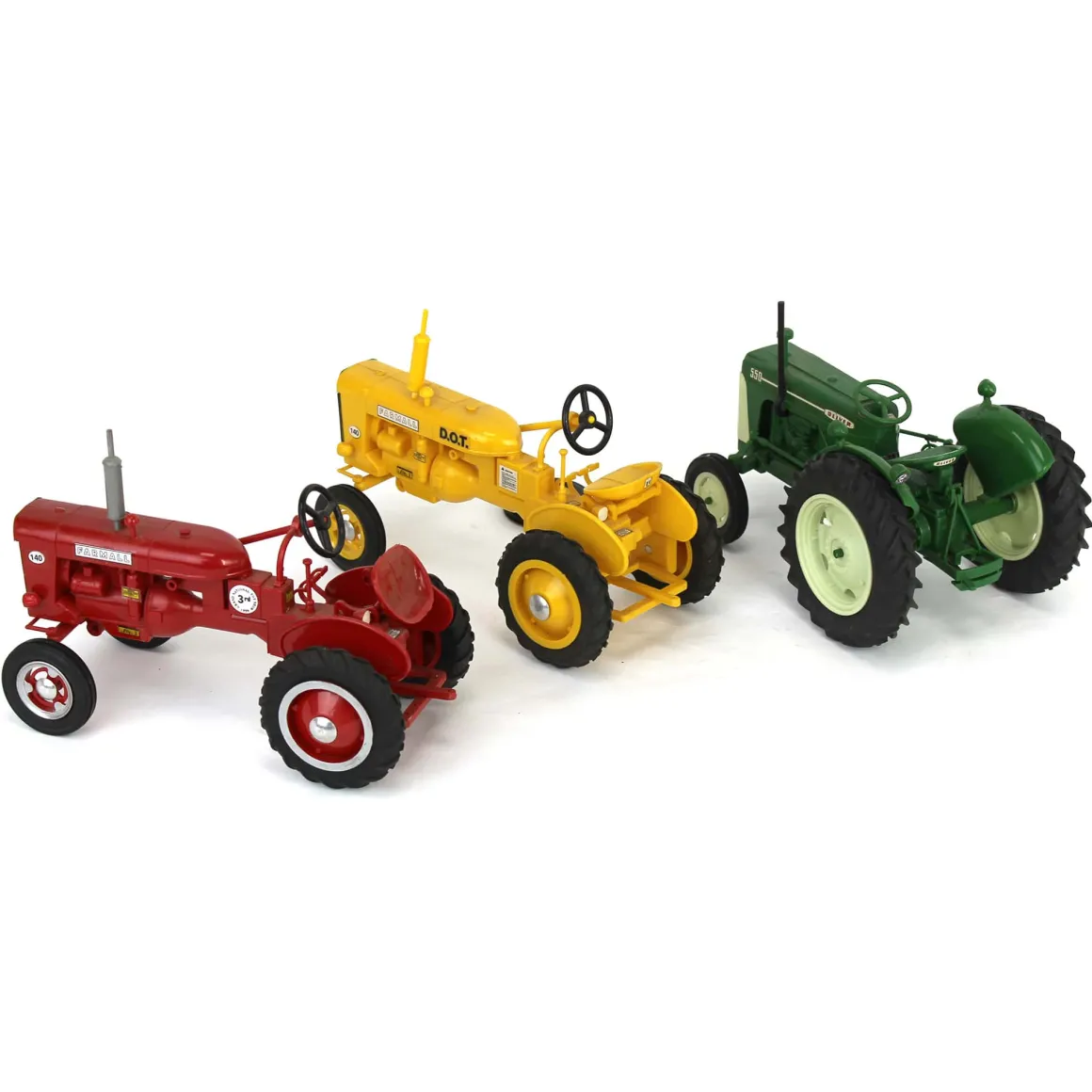 Lot of (2) Plastic Farmall Tractors and (1) Plastic Oliver Tractor