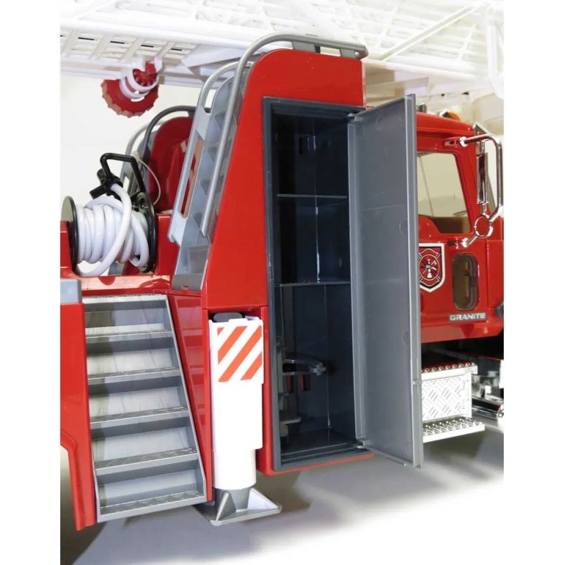 1/16th Mack Granite Fire Engine w/ Extendable Ladder & Hard Hat by Bruder